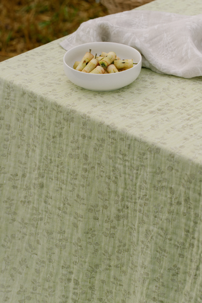 LapuanKankurit-Meirami-linen-cloth-lime-olive-and-Salvia-towel-linen-white-scaled.webp