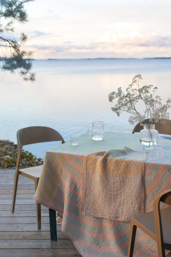LapuanKankurit-Metsalampi-tablecloth-blanket-and-towel-rose-grey-lime-1-scaled.webp