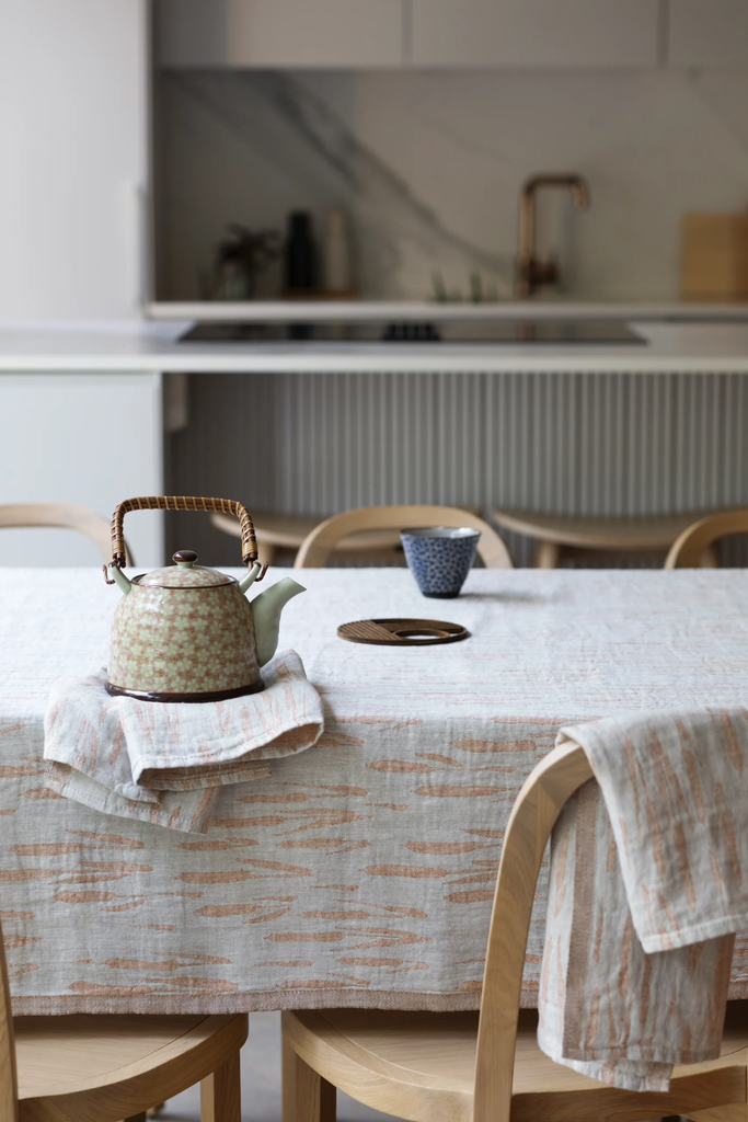 LapuanKankurit-Osmankaami-towel-and-tablecloth-blanket-grey-cinnamon-1-scaled.webp