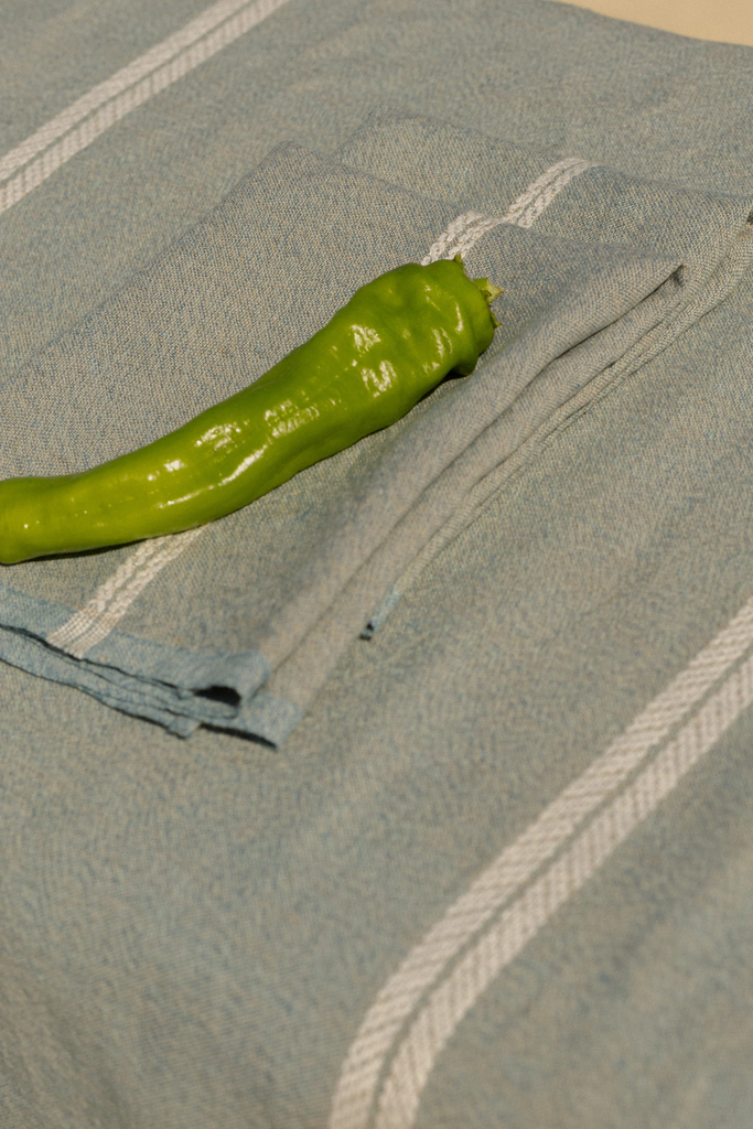 LapuanKankurit-Venla-tablecloth-and-towels-melange-blue-white-1-photocredit-Wilma-Hetemaj-scaled.webp