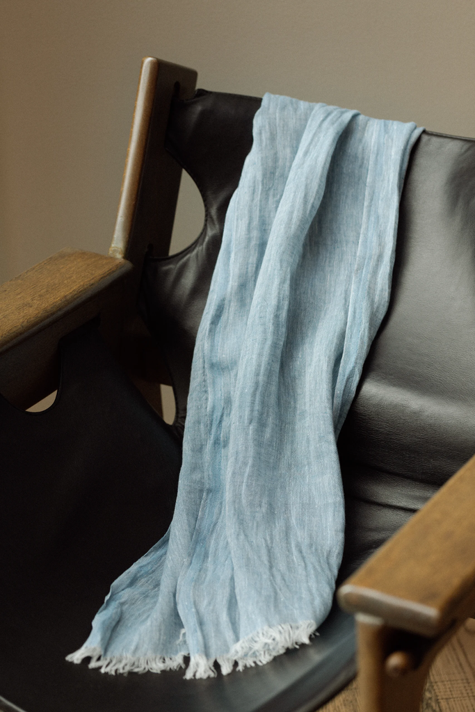 LapuanKankurit-Halaus-scarf-rainy-blue-photocredit-Wilma-Hetemaj-Styling-Susanna-Vento-2-scaled.webp